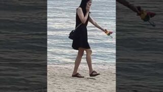 Chinese Girl on Holiday in Pattaya on the Beach