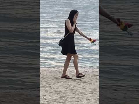 Chinese Girl on Holiday in Pattaya on the Beach
